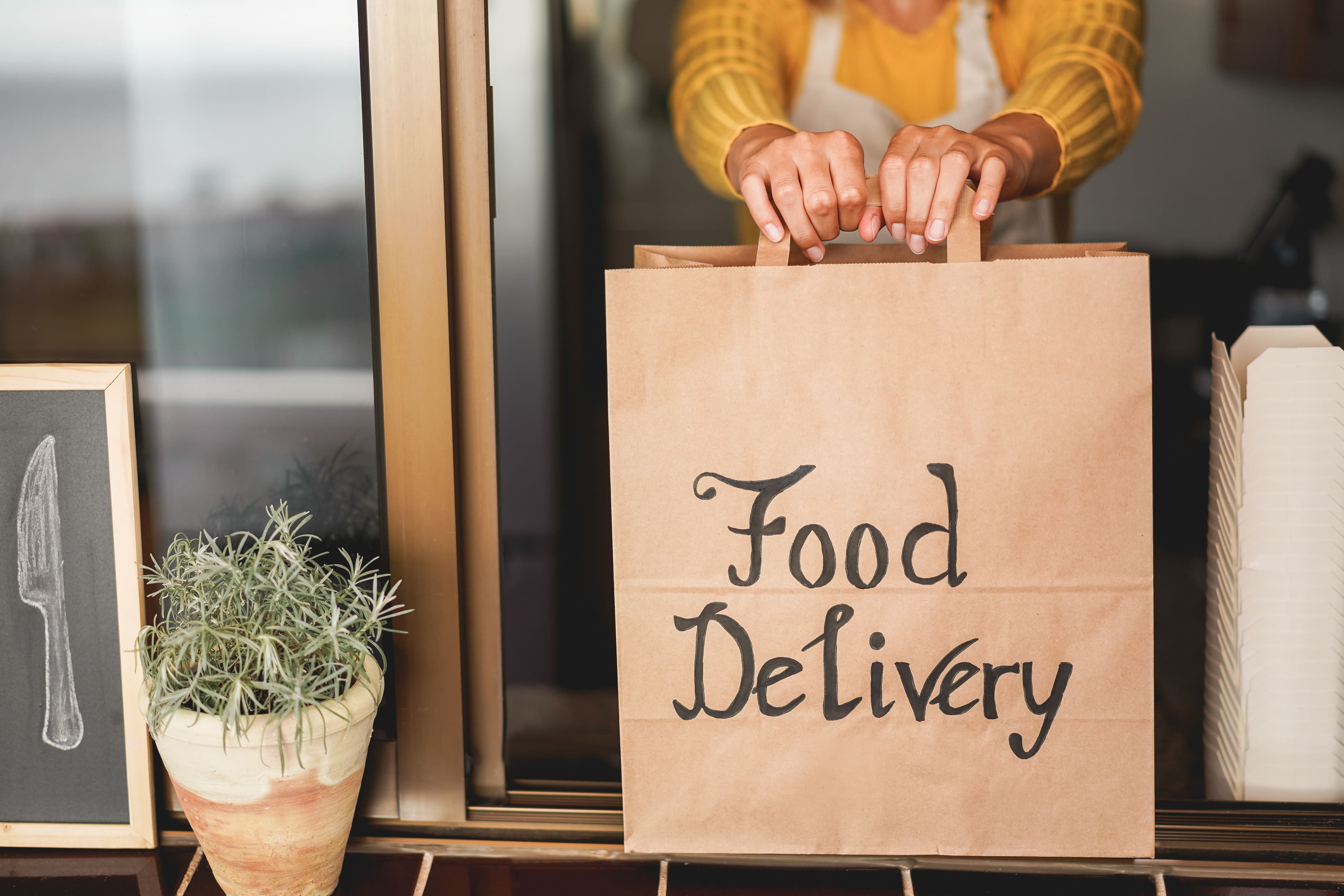 Contactless food delivery from ghost kitchen.