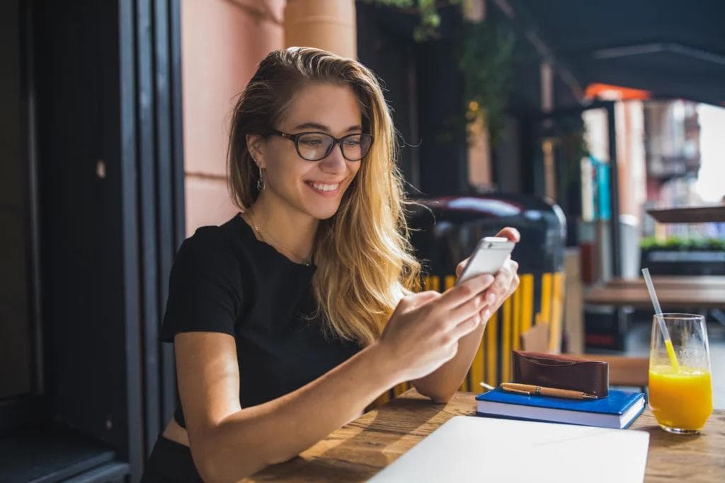 A woman searching how to increase online orders with FineDine.