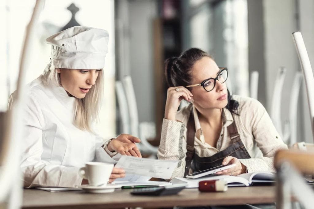 Women sitting at a table.